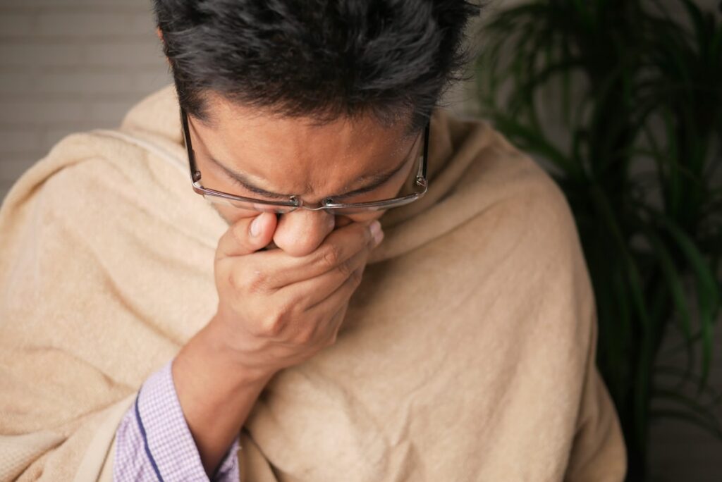 person feeling unwell — Vitalheros