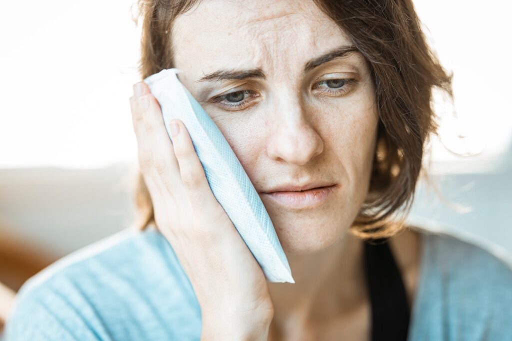 woman experiencing hot flash — Vitalheros